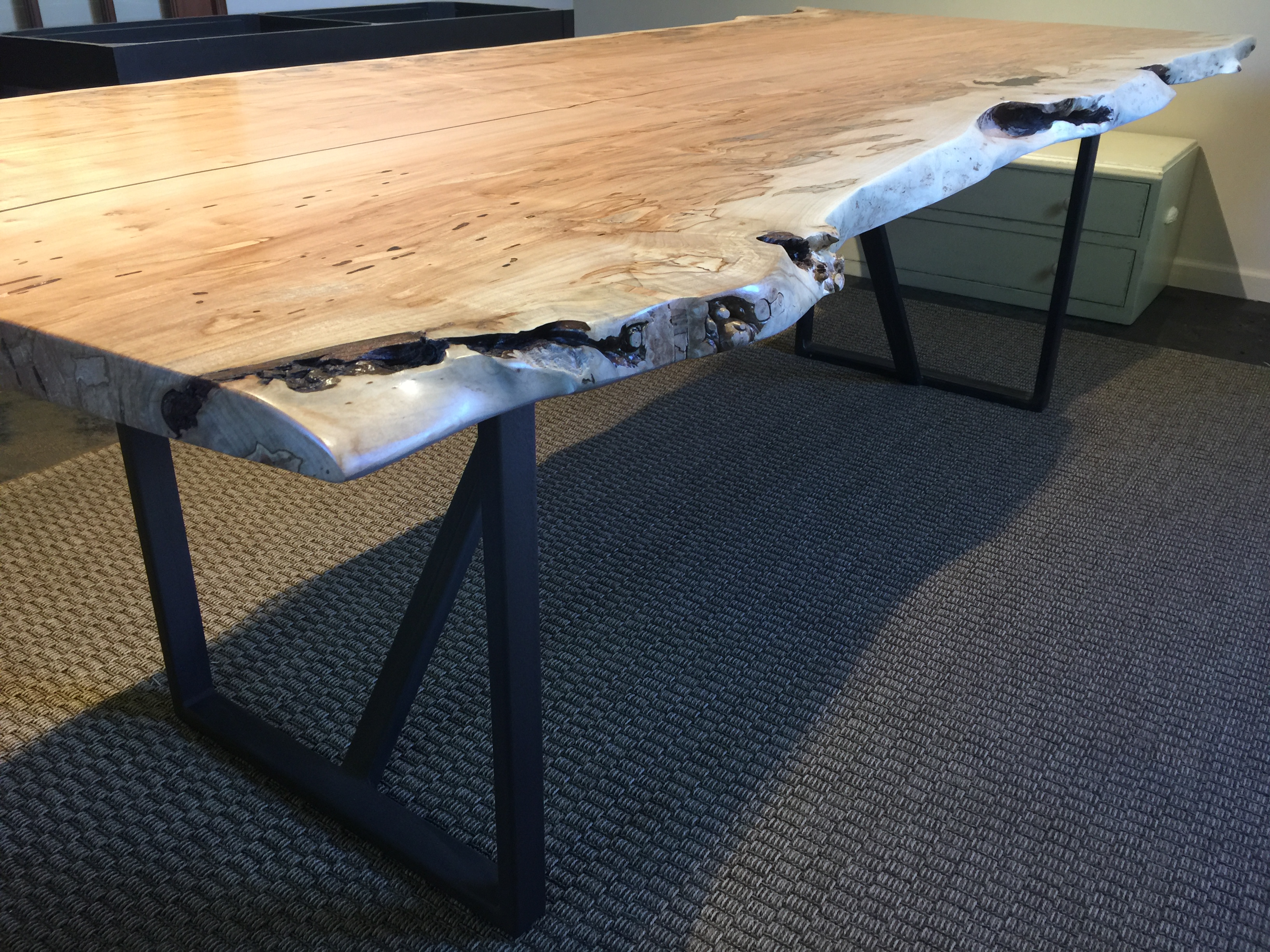 Ambrosia Maple dining table with painted steel legs