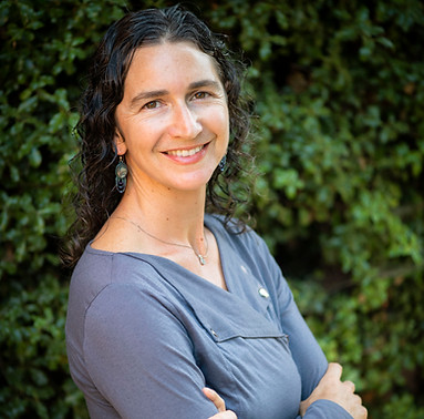 Mneesha Gellman, side profile with less light.jpeg