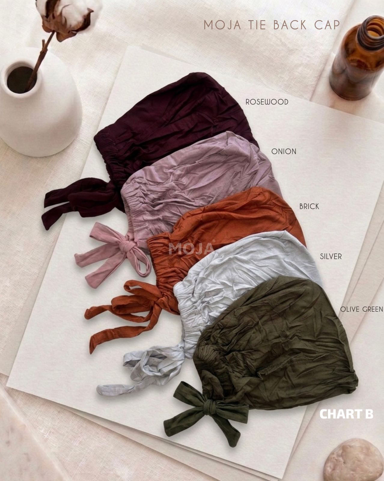 MOJA Tie Cap