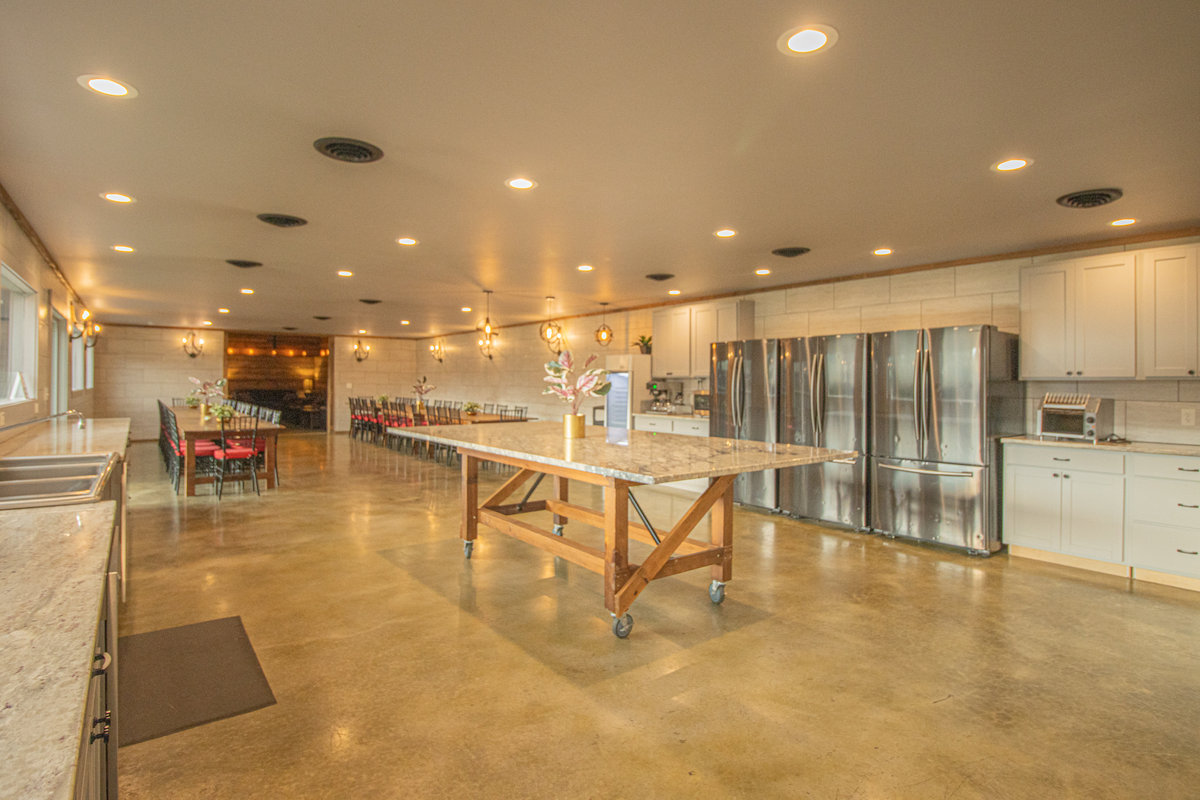 Large kitchen and dining room at Hilltop Castle World, set up to cater for a large group