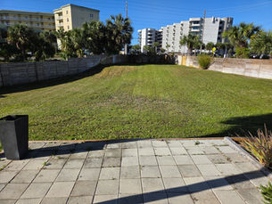 landscaping services in Navarre FL showing fresh lawn and backyard upgrade