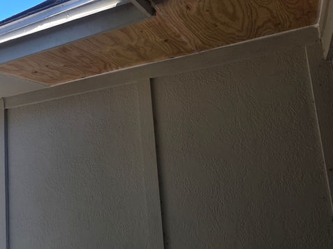 Ceiling renovation project by Curtis Williams Services, showcasing progress on plywood panel installation and structural updates.