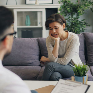Two partners sitting together during couples therapy in Plantation FL