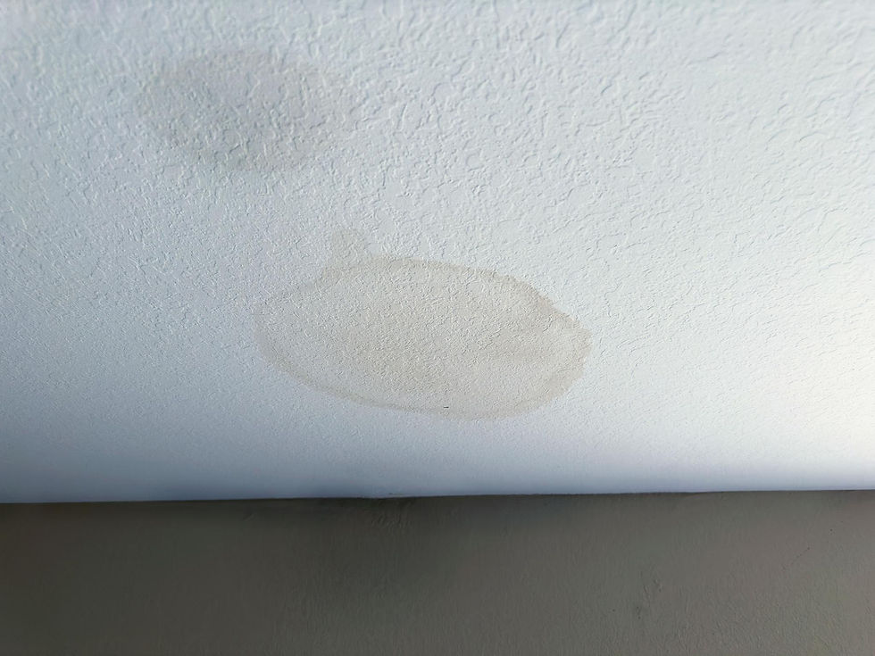 Water stain on ceiling from roof leak in Fort Walton Beach FL home
