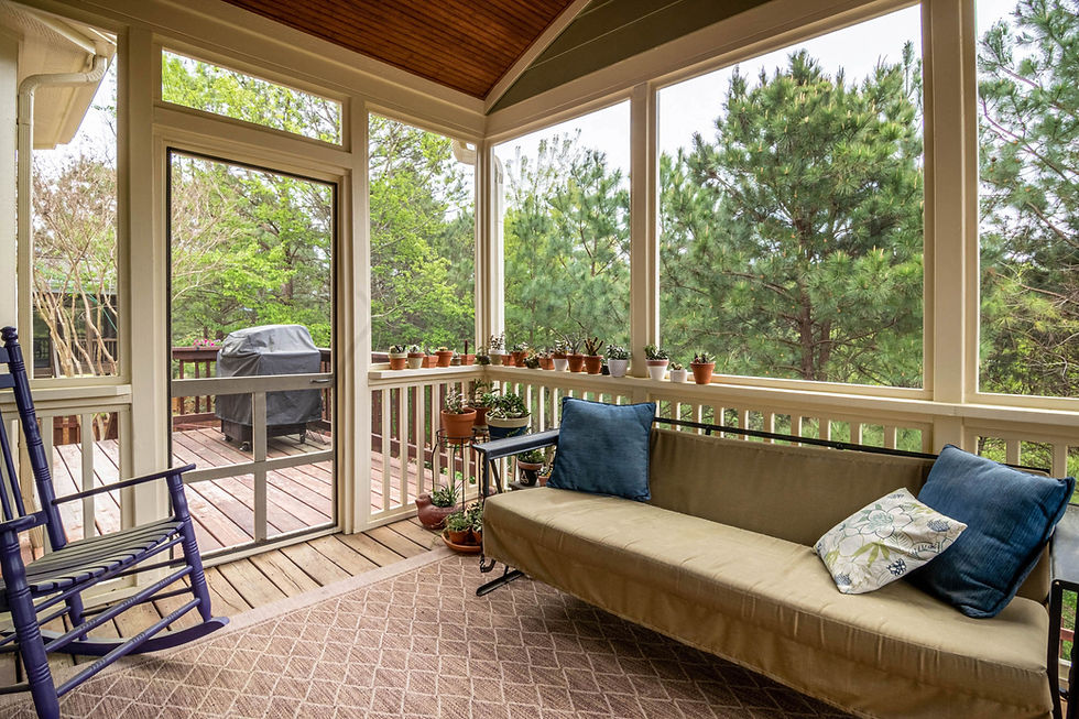 Screened-in patio room with comfortable seating, ideal for enclosing an open patio in Crestview, FL