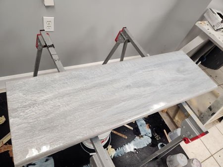 White marble-look epoxy countertop during installation