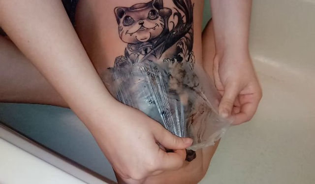 removing wrap from tattoo