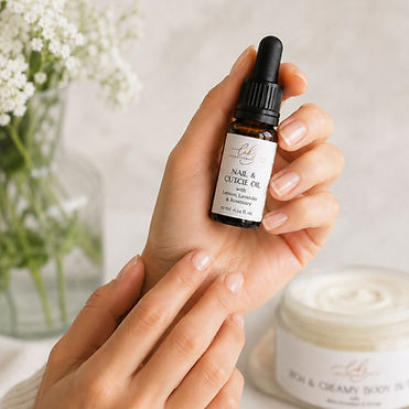 Hand holding Lib’s Aromatherapy nail and cuticle oil with lemon, lavender and rosemary essential oils