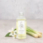 Restore reed diffuser refill with neroli, lemongrass and petitgrain styled with fresh botanicals on a neutral background