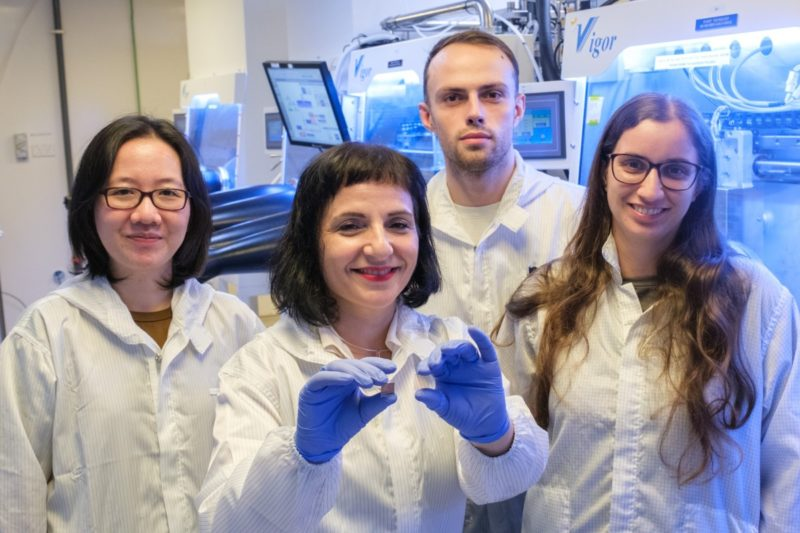 From left: NTU scientists, Dr Herlina A. Dewi; Assoc Prof Annalisa Bruno, who is holding the ultrathin perovskite solar cell in her left hand; Mr Edoardo Albanesi and Dr Daniela De Luca.