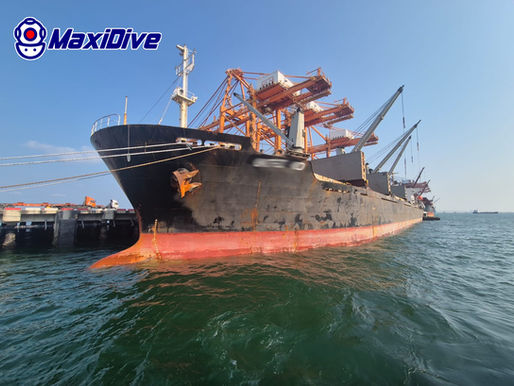 Commercial vessel at Kerry Siam Sea Port during MaxiDive hull cleaning and propeller polishing project in Thailand