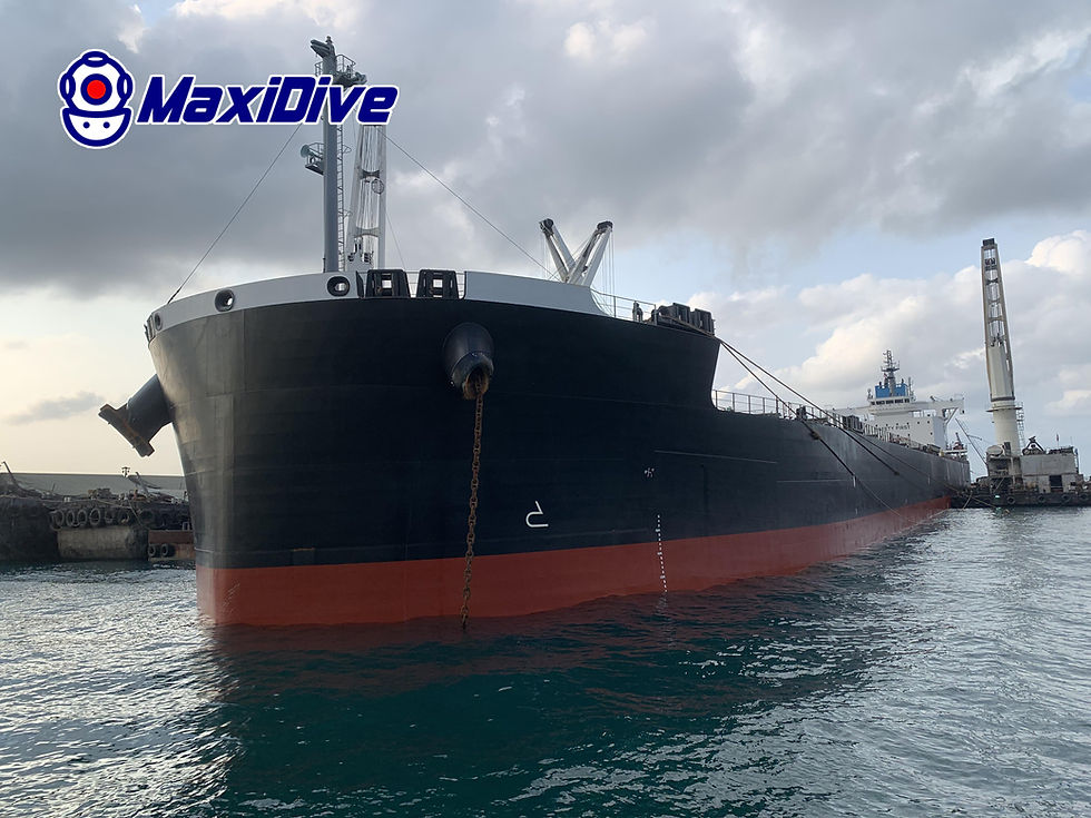 Commercial vessel at Koh Si Chang Anchorage during MaxiDive vertical side cleaning and propeller polishing support in Thailand