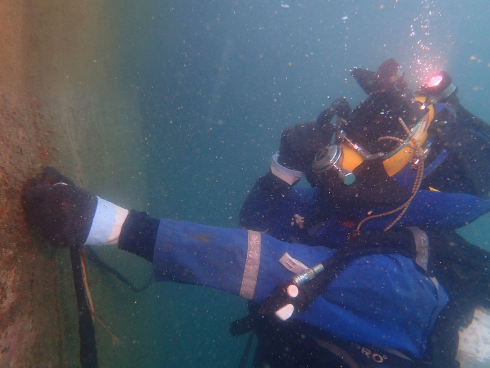 Pre-dry dock underwater inspection of commercial vessel hull to assess structural and coating condition