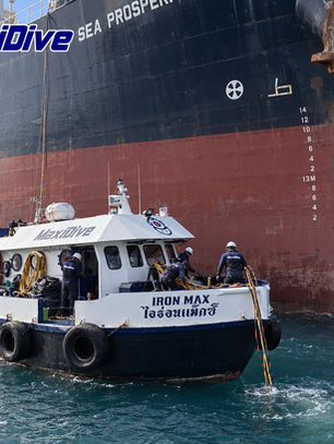 MaxiDive Iron Max support boat alongside commercial vessel during post grounding inspection Thailand