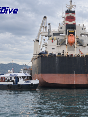 MaxiDive Iron Max support boat beside a commercial vessel during underwater inspection at Koh Si Chang Anchorage