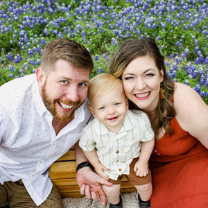 Family smiling in Texas Bluebonnets, Austin