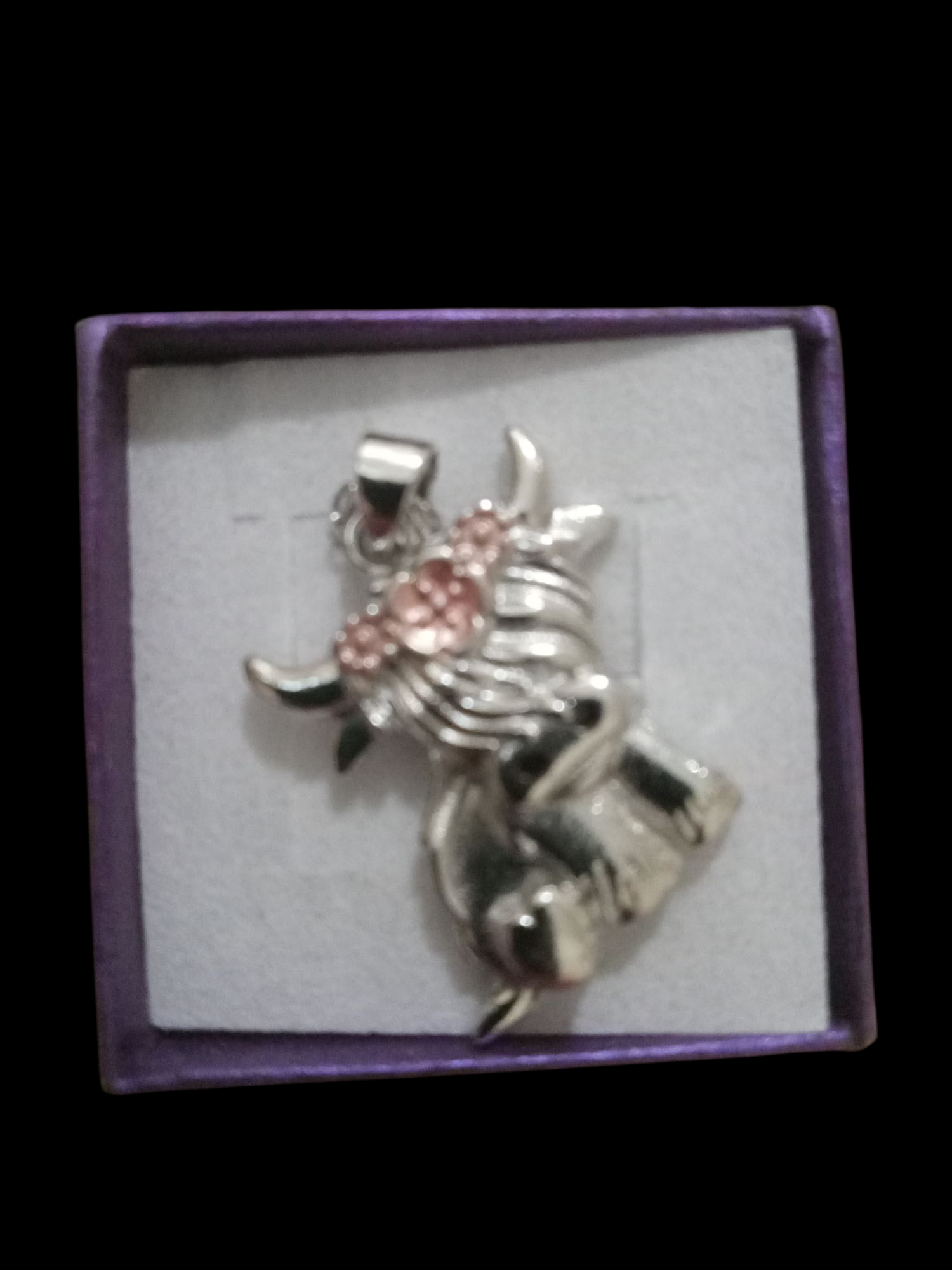 Silver cow with pink accent 