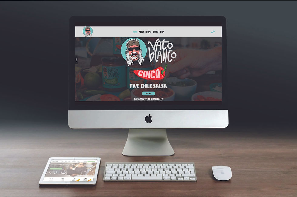 A desktop computer with the Vato Blanco website open