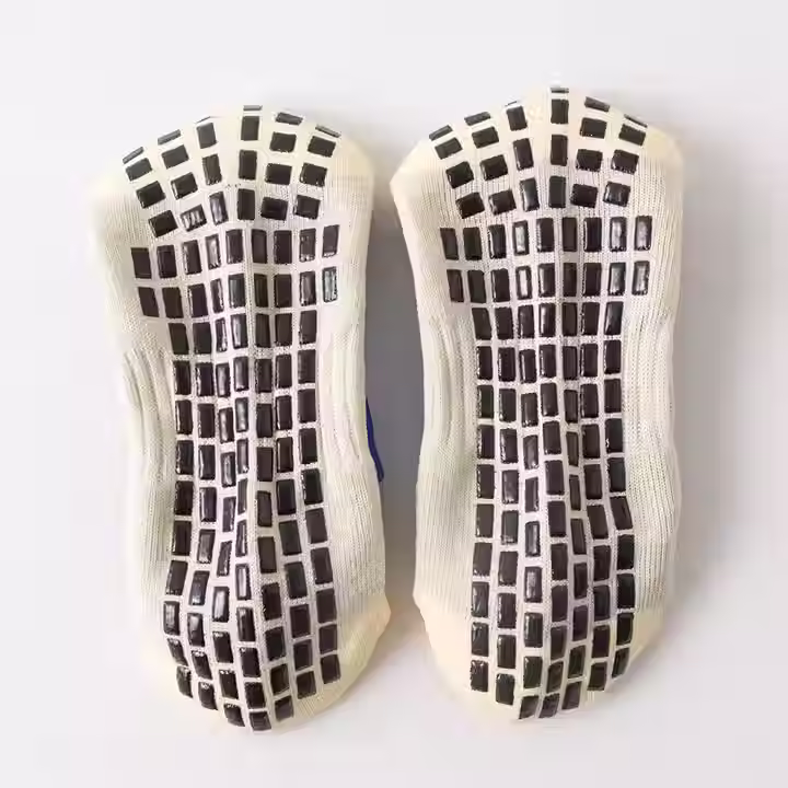 Soccer player wearing DABSoccer grip socks for speed, traction, and control during turf training session