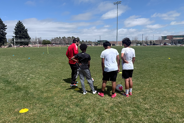 Group of youth soccer players participating in pre-season training at Fort Carson with DABSoccer LLC. Focused on physical conditioning, footwork drills, and tactical sessions to prepare for high school and competitive club soccer in Colorado Springs, Fountain, Peyton, and surrounding areas.