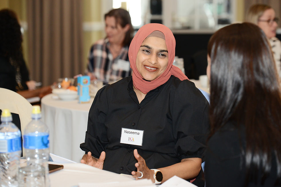 Health Coach student Naseema practising at live training event