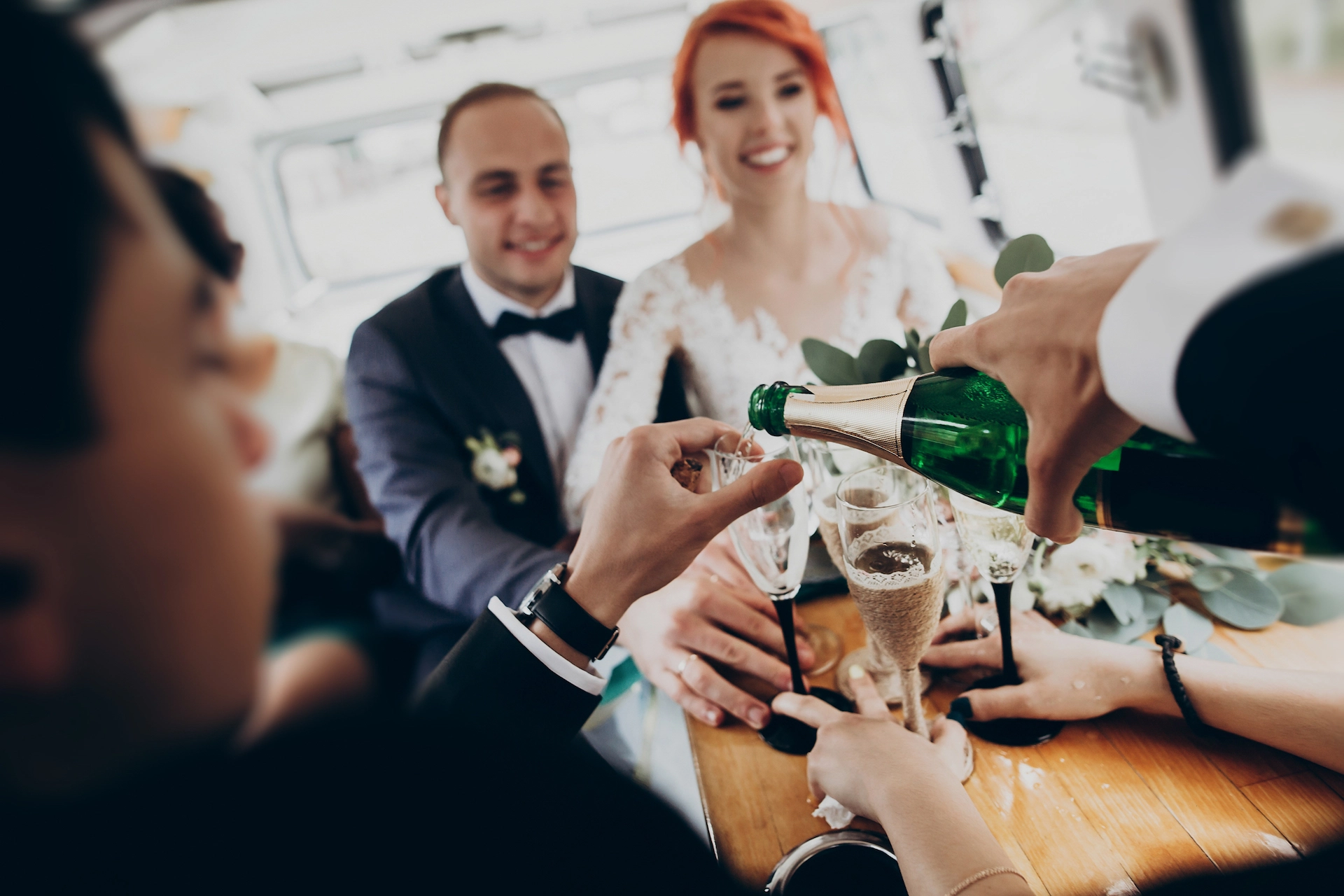 guests are celebrating with the groom and bride