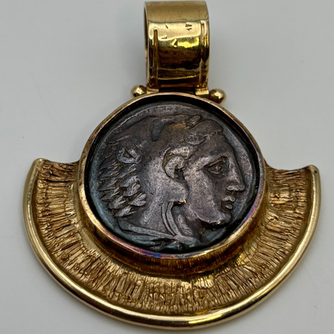 Front of pendant/drachma featuring Alexander the Great