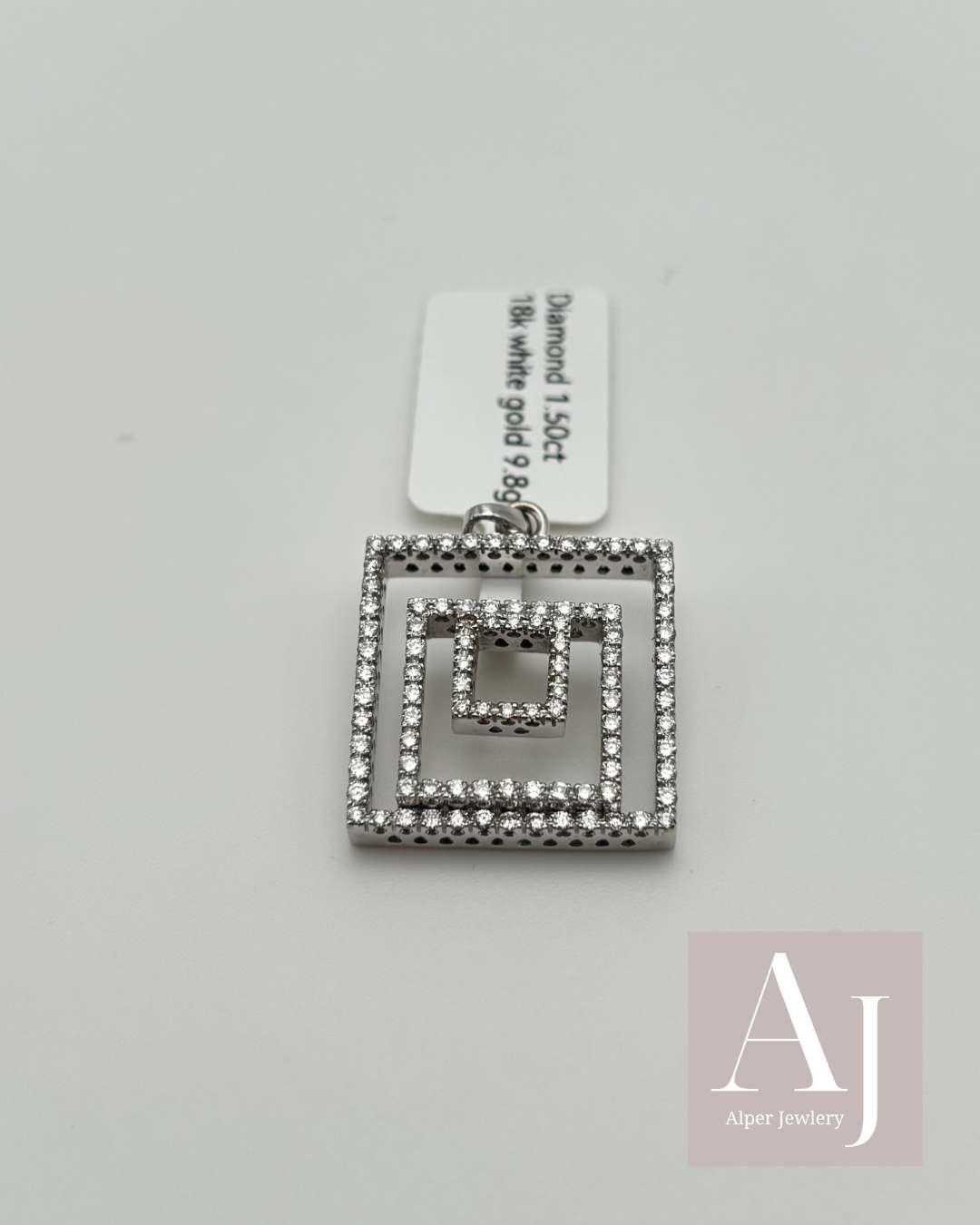 18k white gold and diamond square pendant