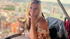 Kelly holding wine