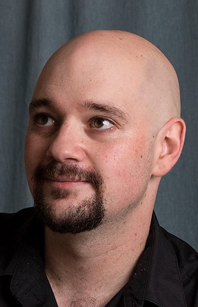 A photograph of Central Acupuncture and Health's only acupuncturist — Joshua Smolkin.