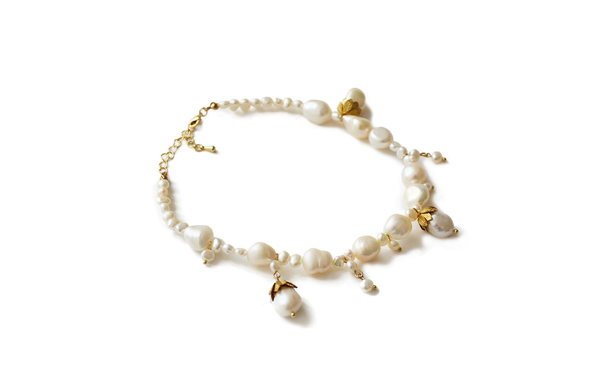 Le Ras de cou perles blanches Muse