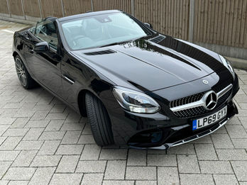 2019 Mercedes SLC 200 AMG Line convertible, premium sports car featuring a sleek design, automatic transmission, and AMG styling enhancements for a dynamic driving experience.