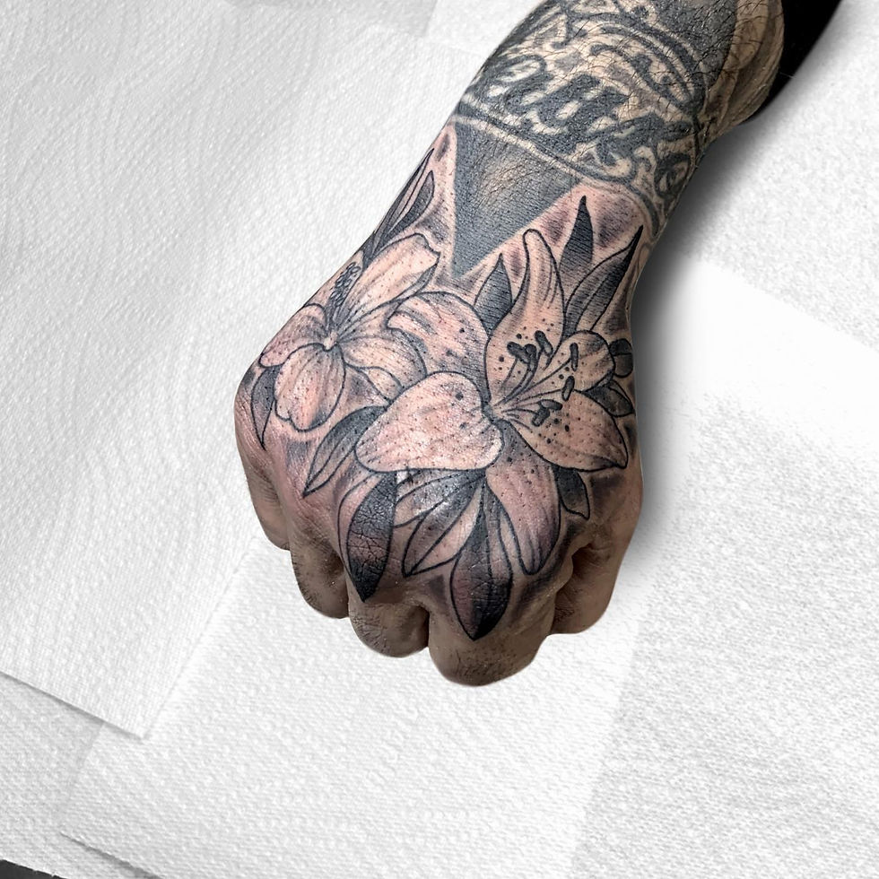 Hand Lily Tattoo