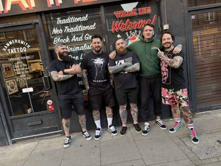 Hammersmith Tattoo London resident artists standing outside the studio in West London