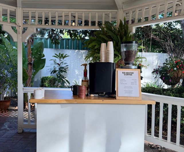Mobile espresso bar serving guests at a wedding reception