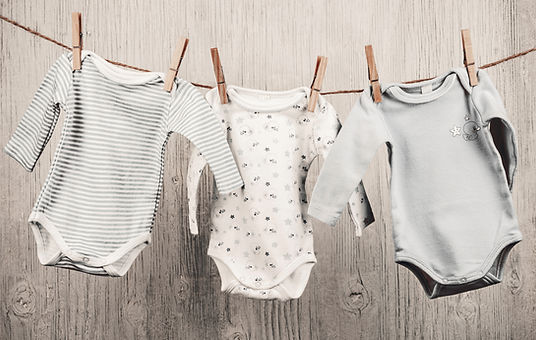 Baby Laundry Hanging on a Clothesline
