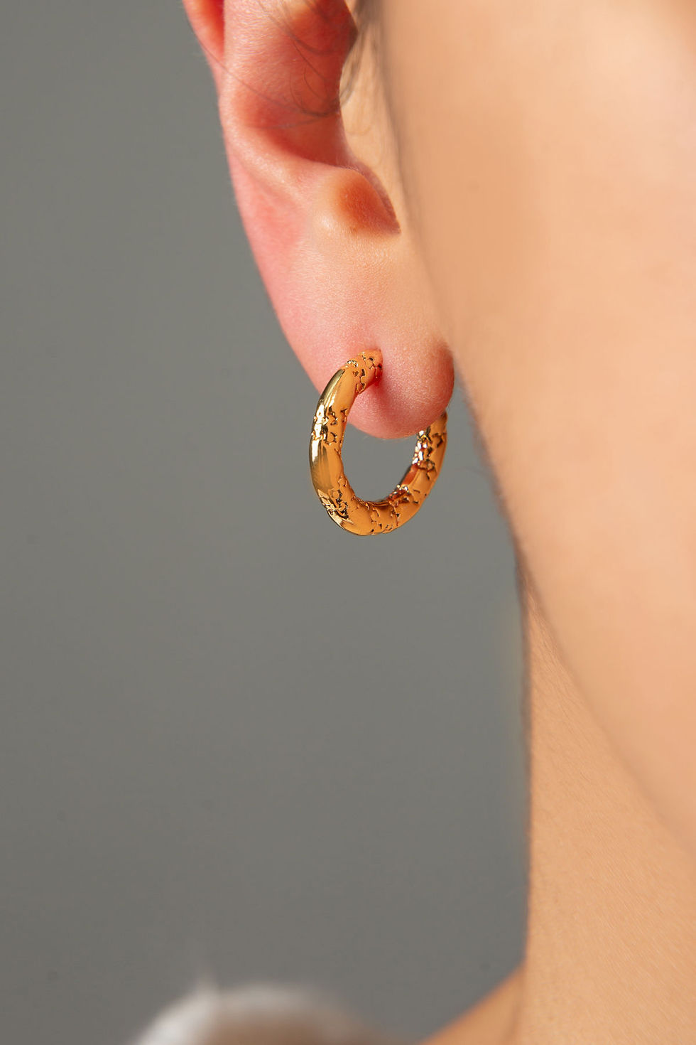 Thumbnail: GleamGuard Metal Earrings: Allure & Assurance