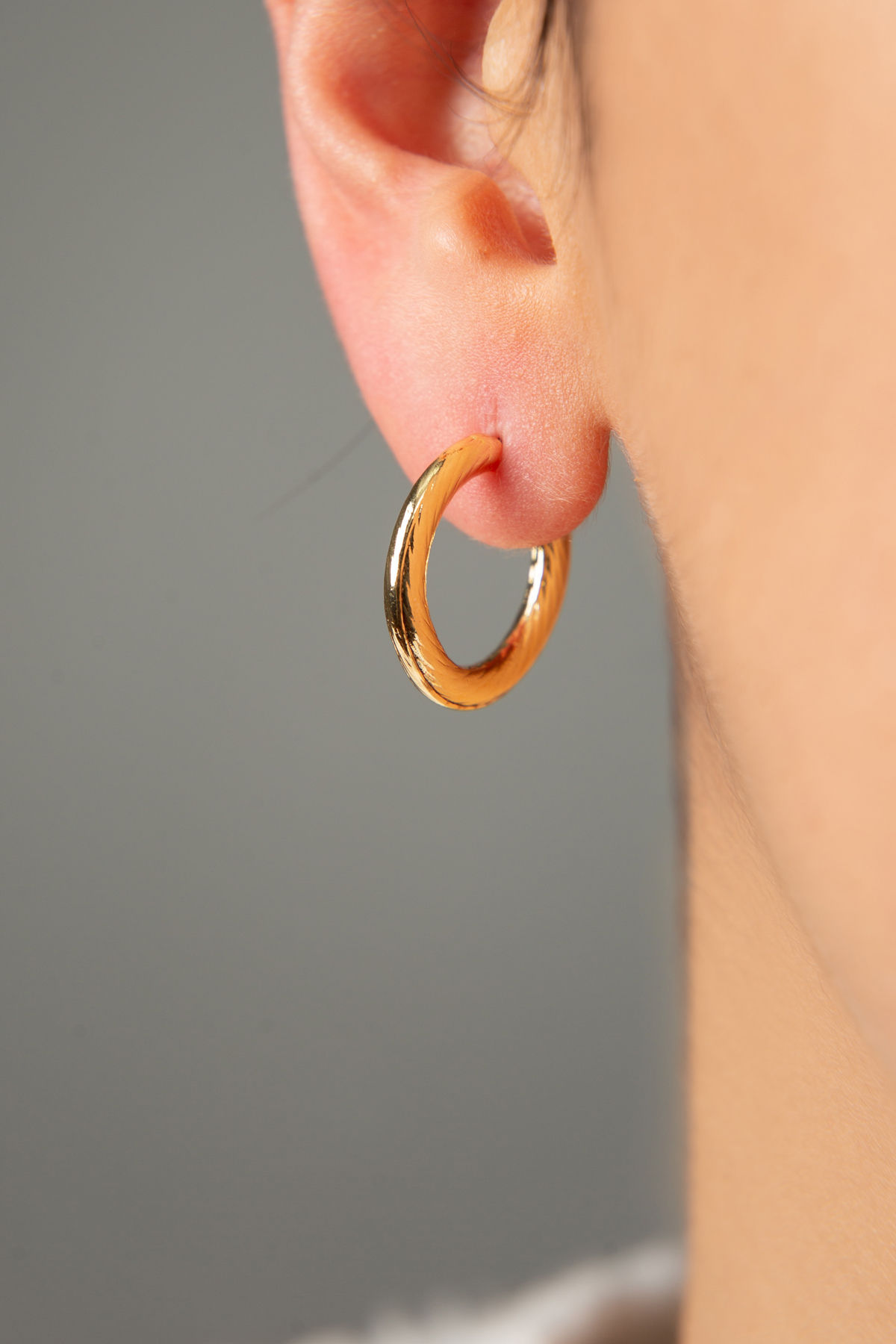 GleamGuard Metal Earrings: Allure & Assurance