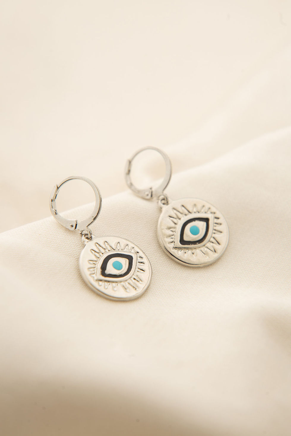 Thumbnail: GleamGuard Metal Earrings: Allure & Assurance
