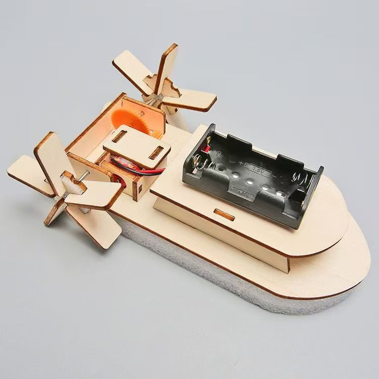 Thumbnail: Wooden model boat with propellers and battery slot