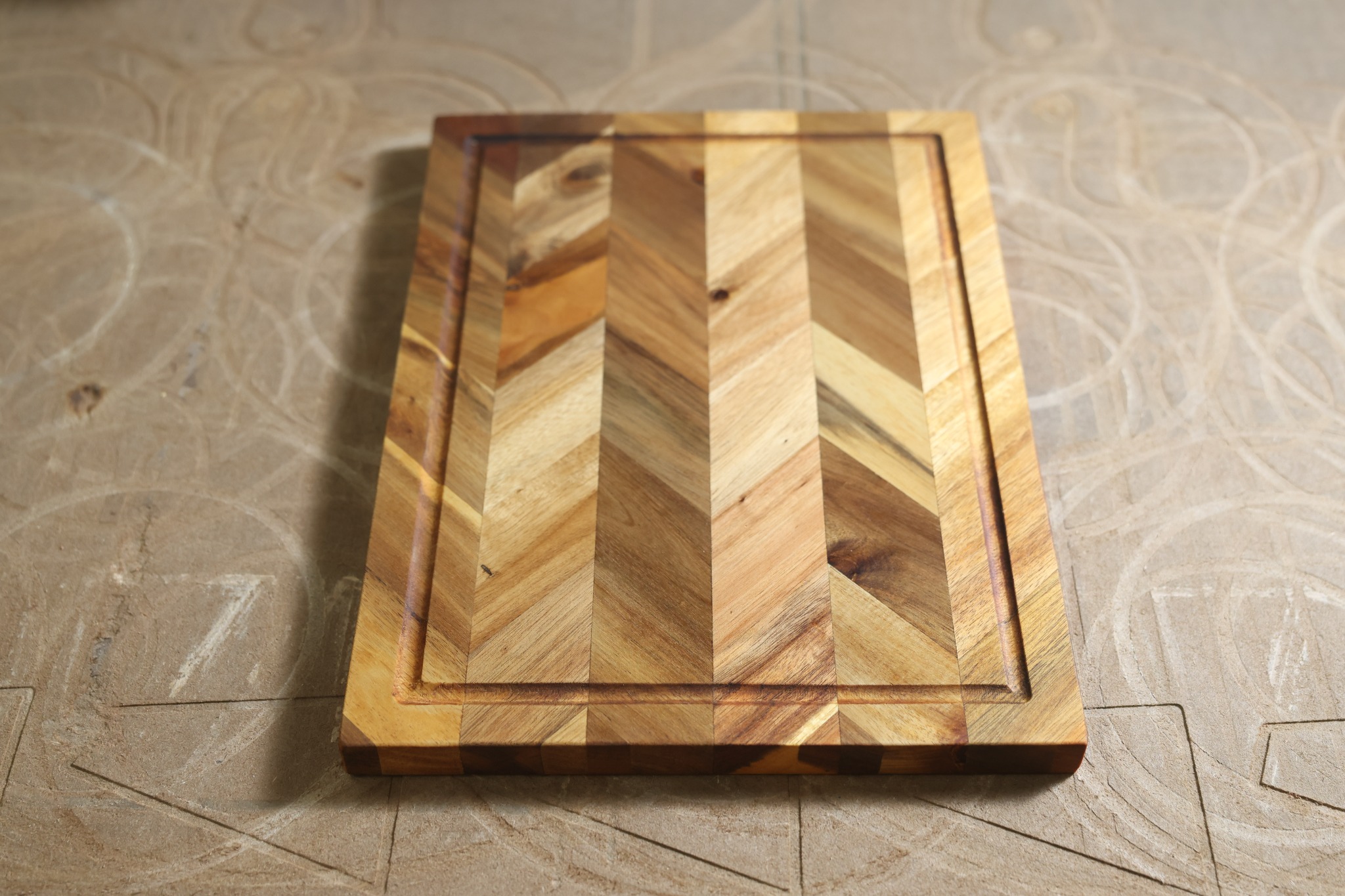 Chevron cutting board photographed from a second overhead angle