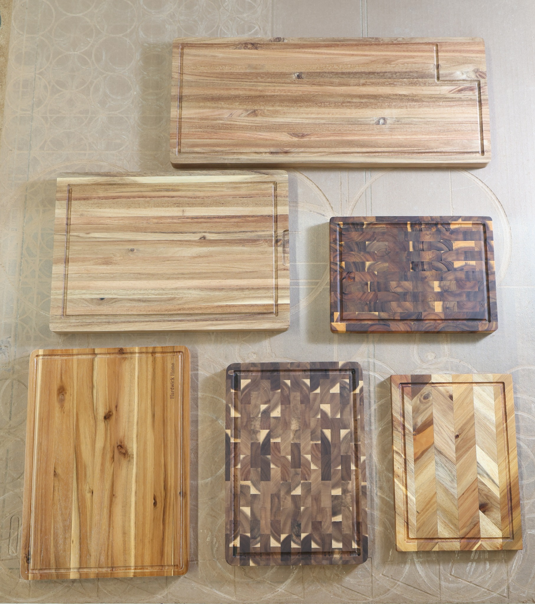 Six cutting board designs showing different grain layouts, sizes and grooves