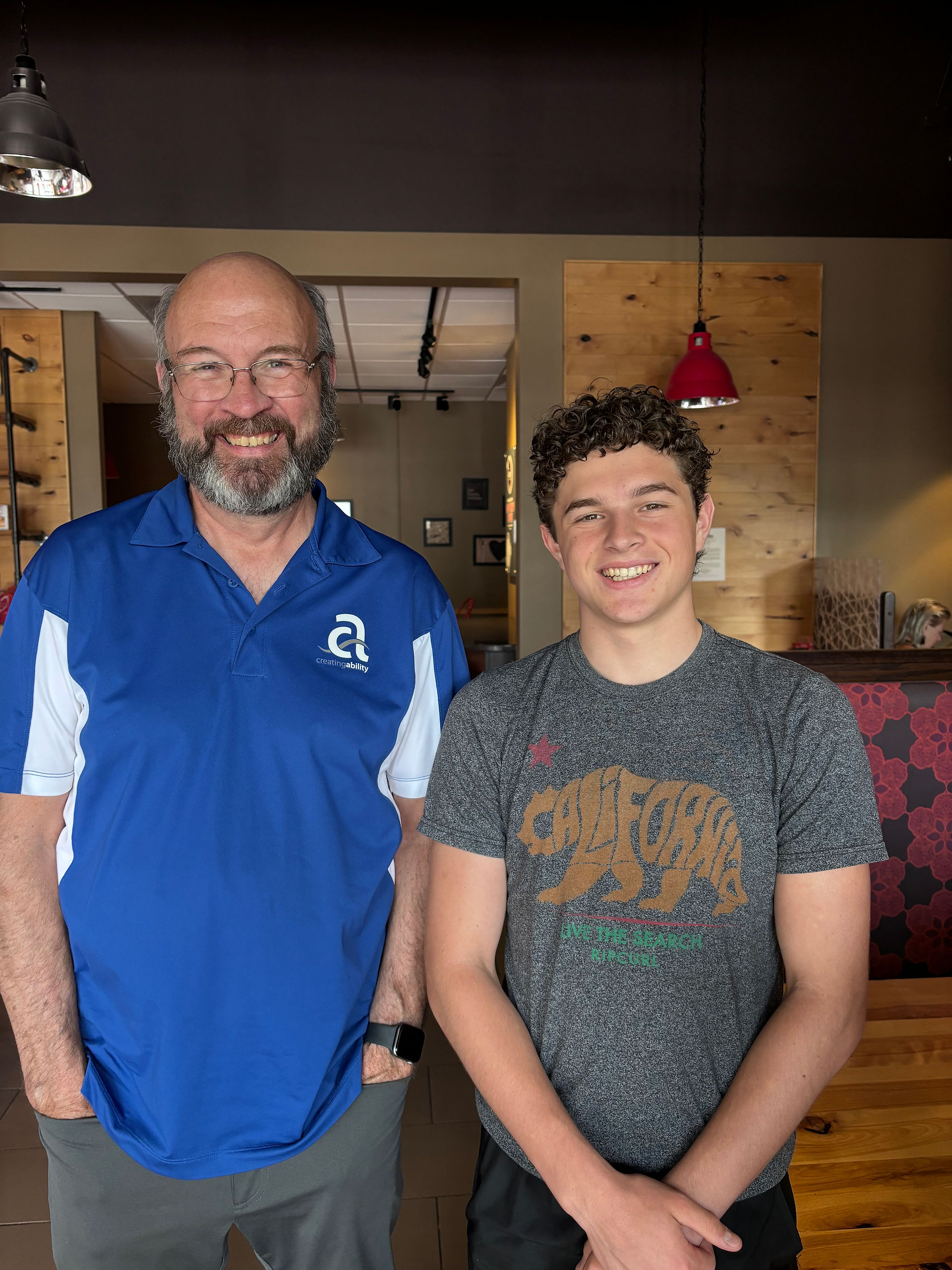 Kevin Carr of Creating Ability with Caleb - both smiling and looking at the camera