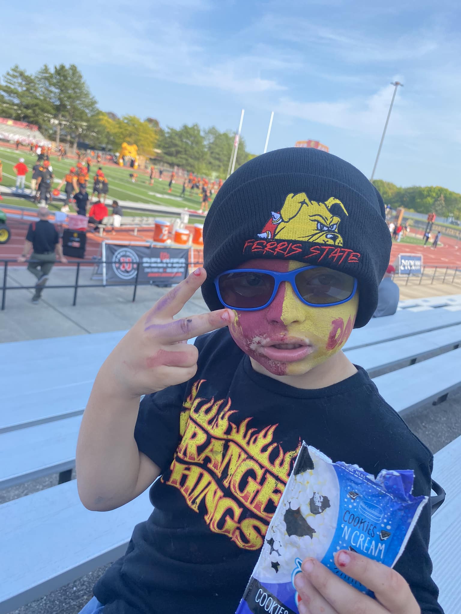 Mason with face paint at Ferris State