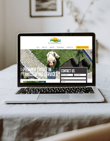 Laptop on the Kitchen Table showing GK Landscape LLC's website