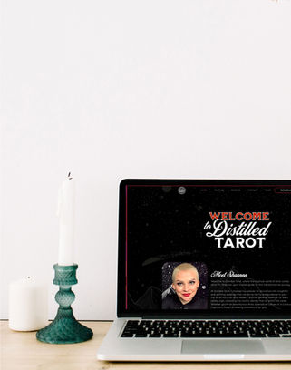 Laptop with Decors Mockup of Distilled Tarot's website