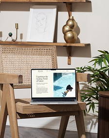 relax template on a laptop sitting on a rattan chair