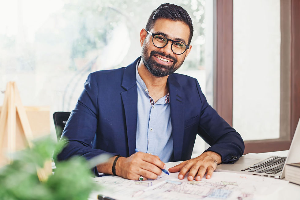 handsome-bearded-indian-architect-working-from-home.jpg
