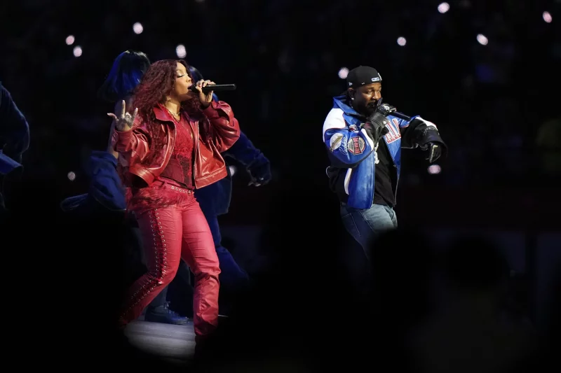 SZA, left, and Kendrick Lamar onstage during Lamar's halftime performance.