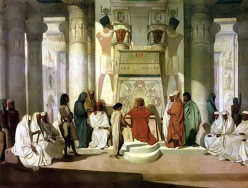 Joseph interprets the dream of Pharaoh in a 19th-century painting by Jean-Adrien Guignet.